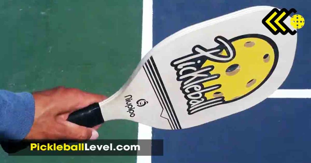 shape and grip of a wooden pickleball paddle